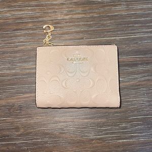 Tan Coach Wallet with Burgundy Interior